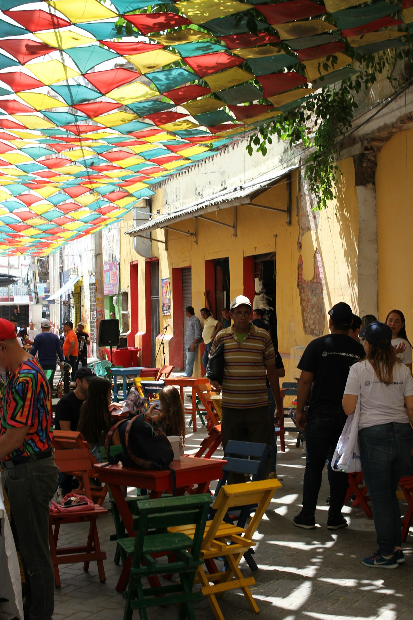 Colorful colonial buildings lining the streets of Jardín during a festive celebration